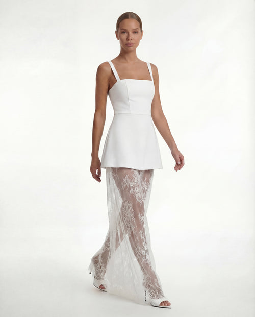 Aurora dress in ivory on model, front view
