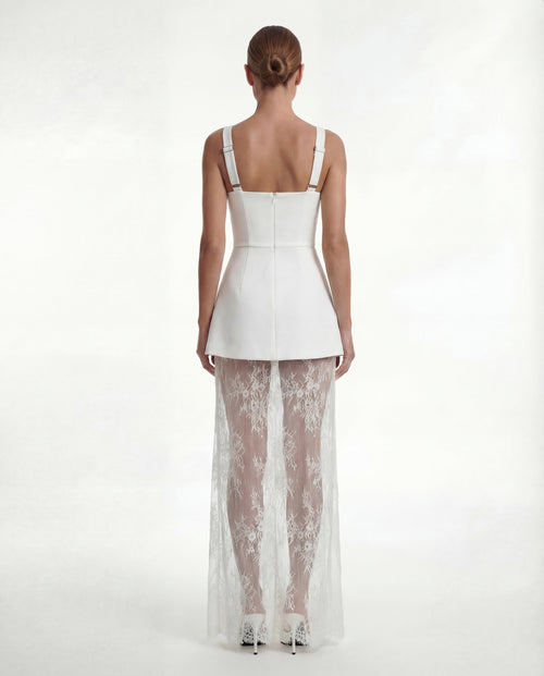Aurora dress in ivory on model, back view